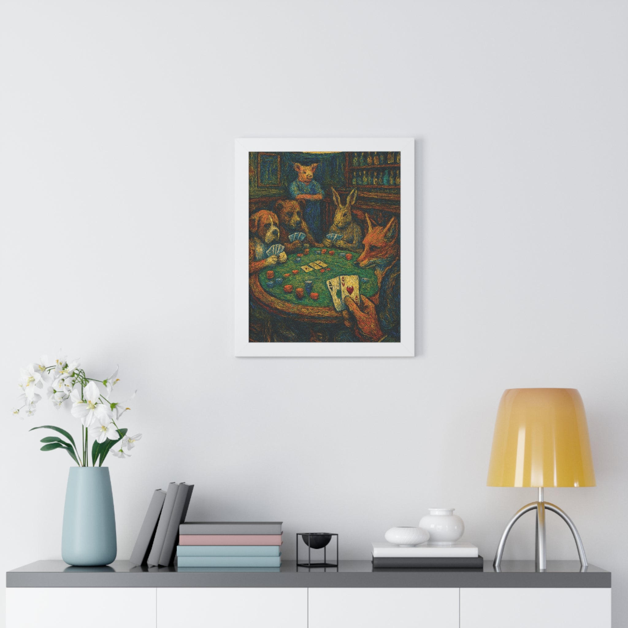 Framed artwork of animals playing poker on a wall above a shelf with decor items.